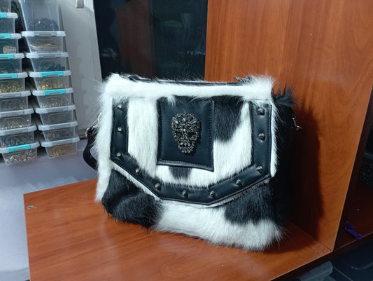 Custom consealed carry hand-bag inspired by Cruella dalmatian coat