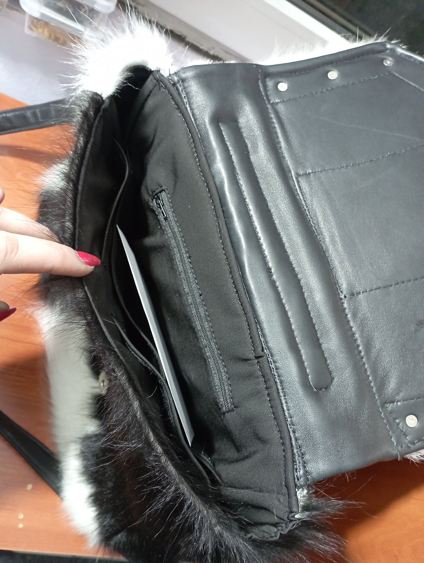 Custom consealed carry hand-bag inspired by Cruella dalmatian coat